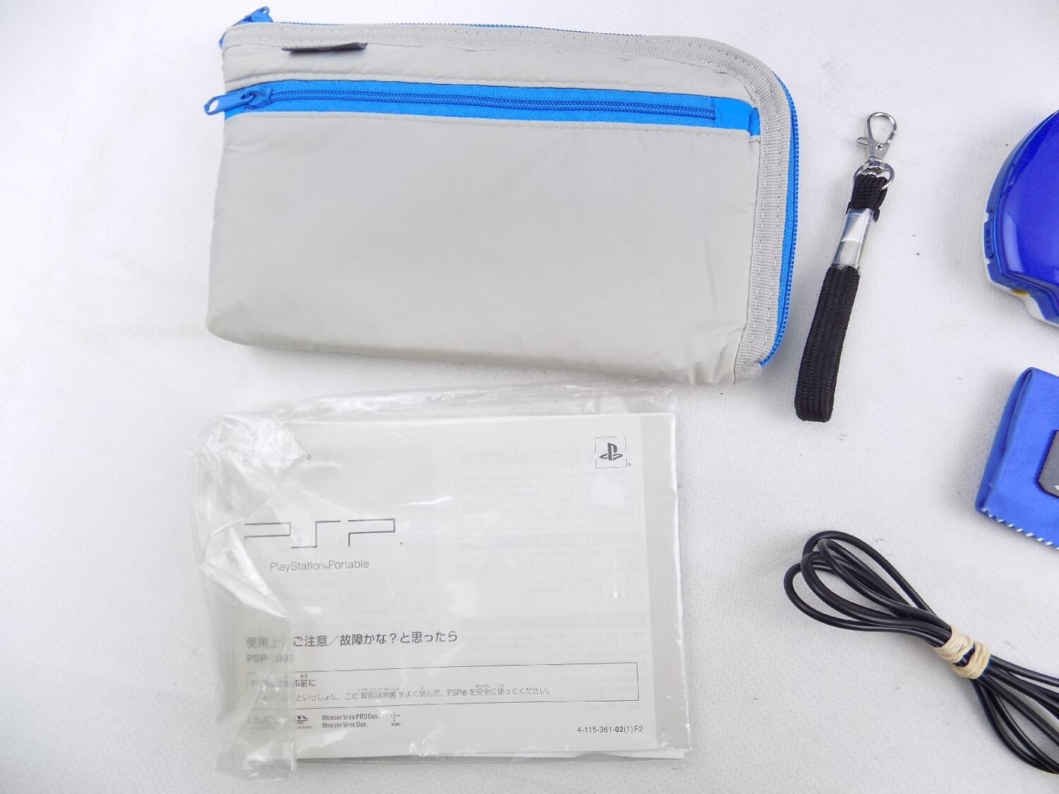 Boxed Like New PSP 3000 Playstation Portable (White/Blue) Console Value